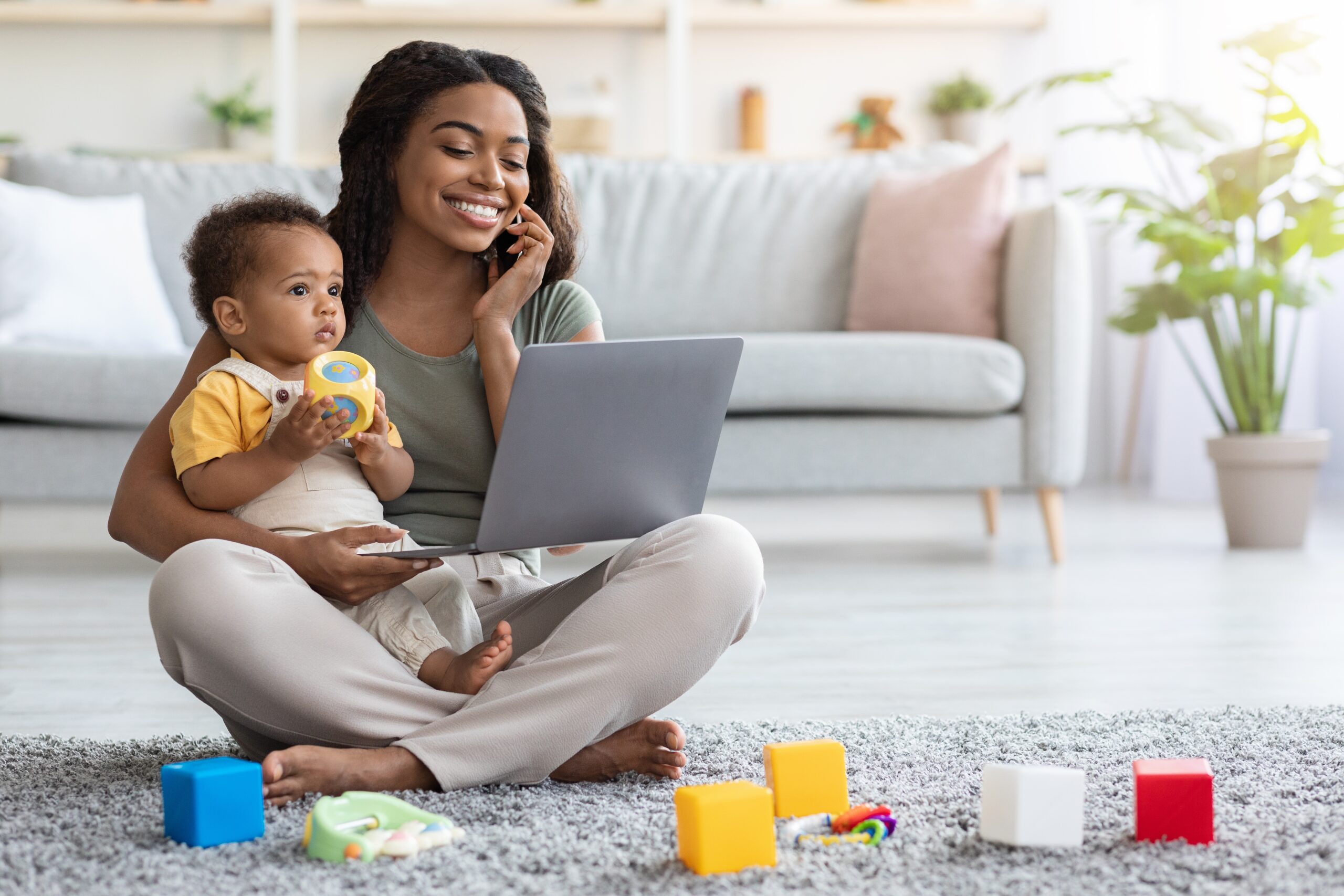 Remote,Business.,Portrait,Of,Happy,Black,Woman,With,Baby,Working Remote,Business.,Portrait,Of,Happy,Black,Woman,With,Baby,Working
